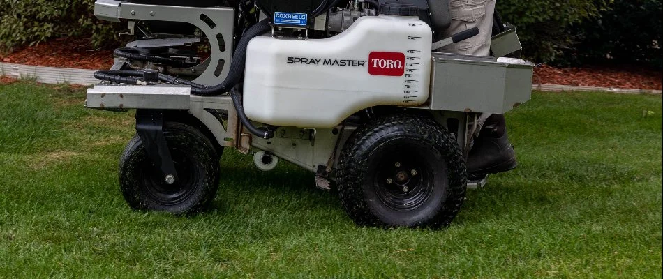 Applicator machine on a lawn in Plainwell, MI.