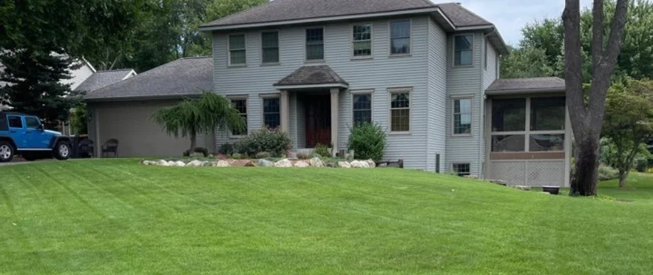 Green lawn in front of a house in Grand Rapids, MI.