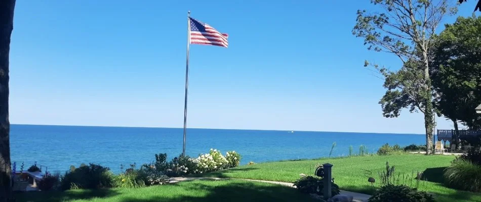 Property on lake with flag in Saugatuck, MI.